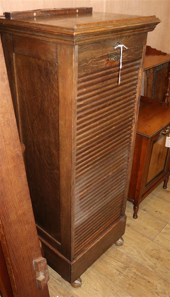A 1920s oak tambour filing cabinet W.50cm